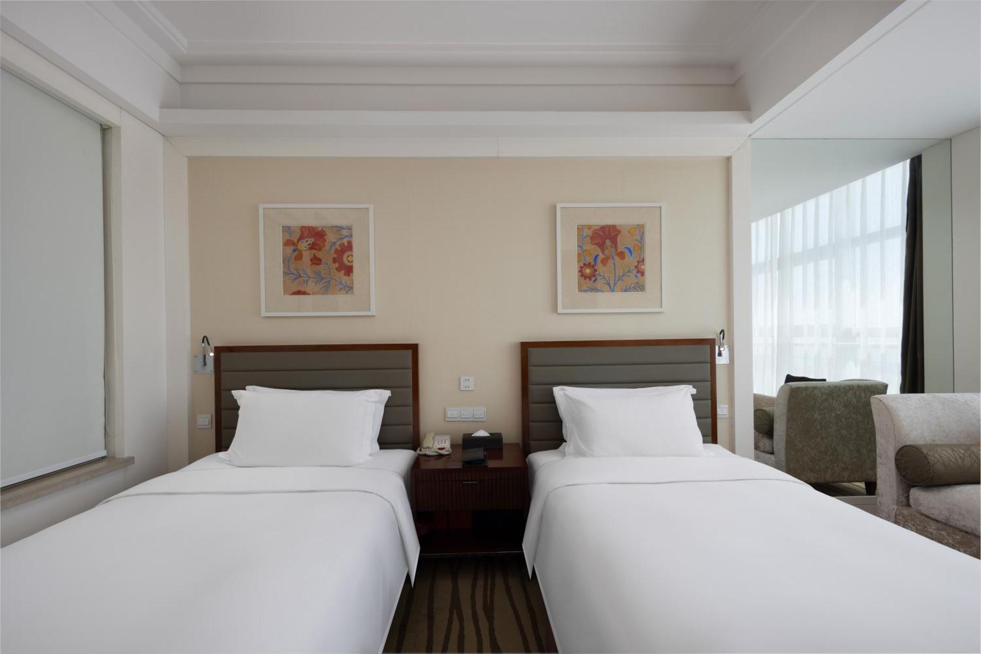 New Century Hotel Циндао Экстерьер фото